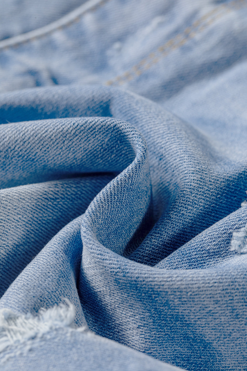 Beau Blue Asymmetric Raw Hem Distressed Whiskery Denim Shorts